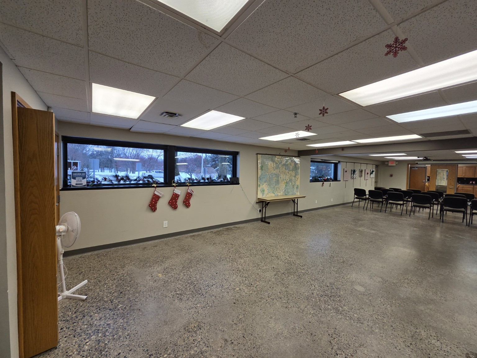 Spacious meeting room at Eden Prairie Senior Center with new energy‑efficient windows