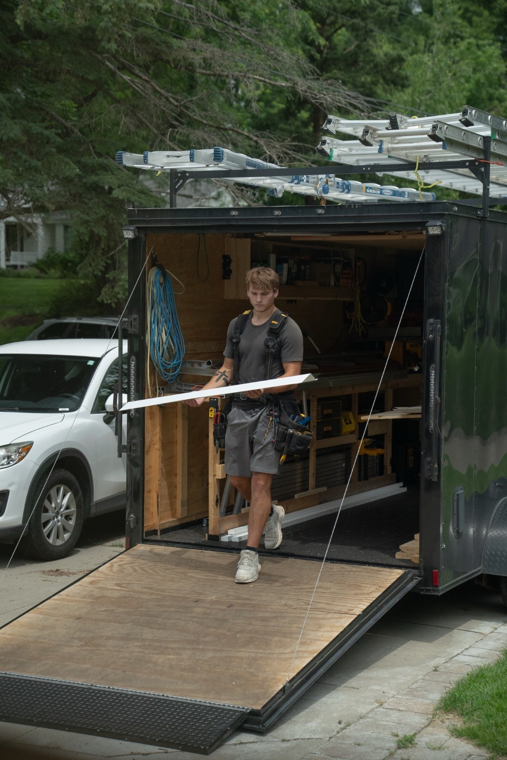 Loading materials from the mobile workshop trailer